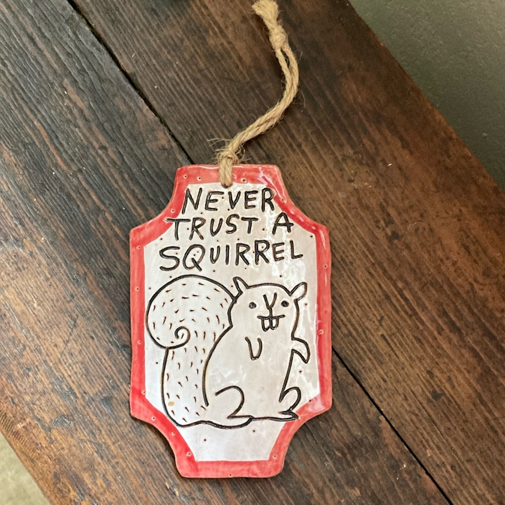 Never trust a Squirrel Small Hanging Sign